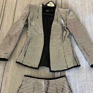Silver shorts, with a matching blazer